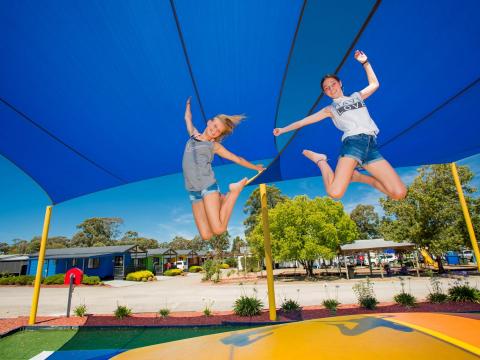 BIG4 Bendigo Park Lane Holiday Park - Jumping Cushion - 2 girls jumping