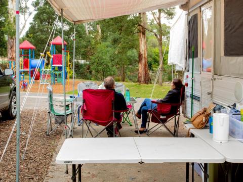 BIG4 Yarra Valley Park Lane Holiday Park - Couple Relaxing at their Caravan